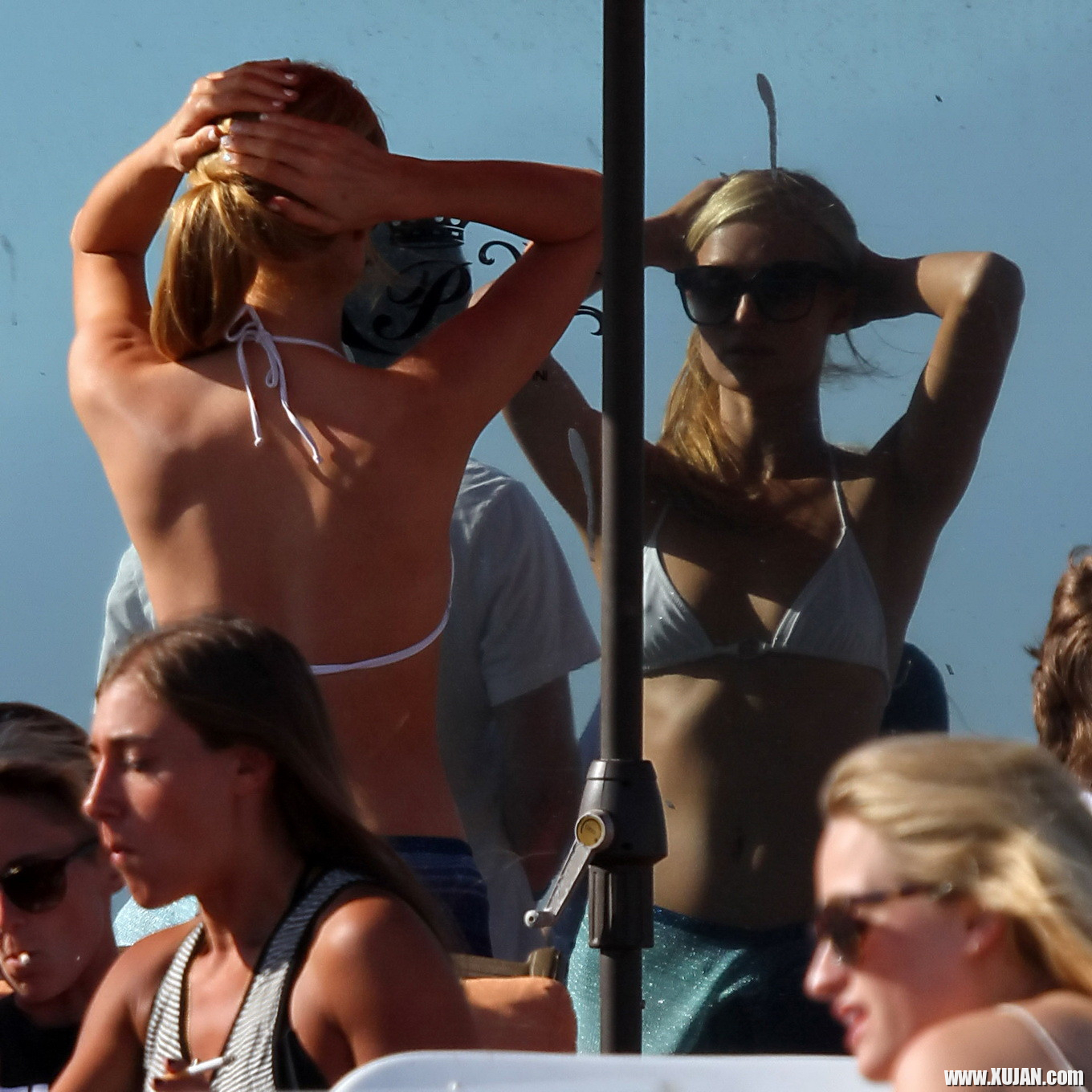 Paris Hilton showing her hard pokies in white transparent bikini top on the beac - Photo #1480149