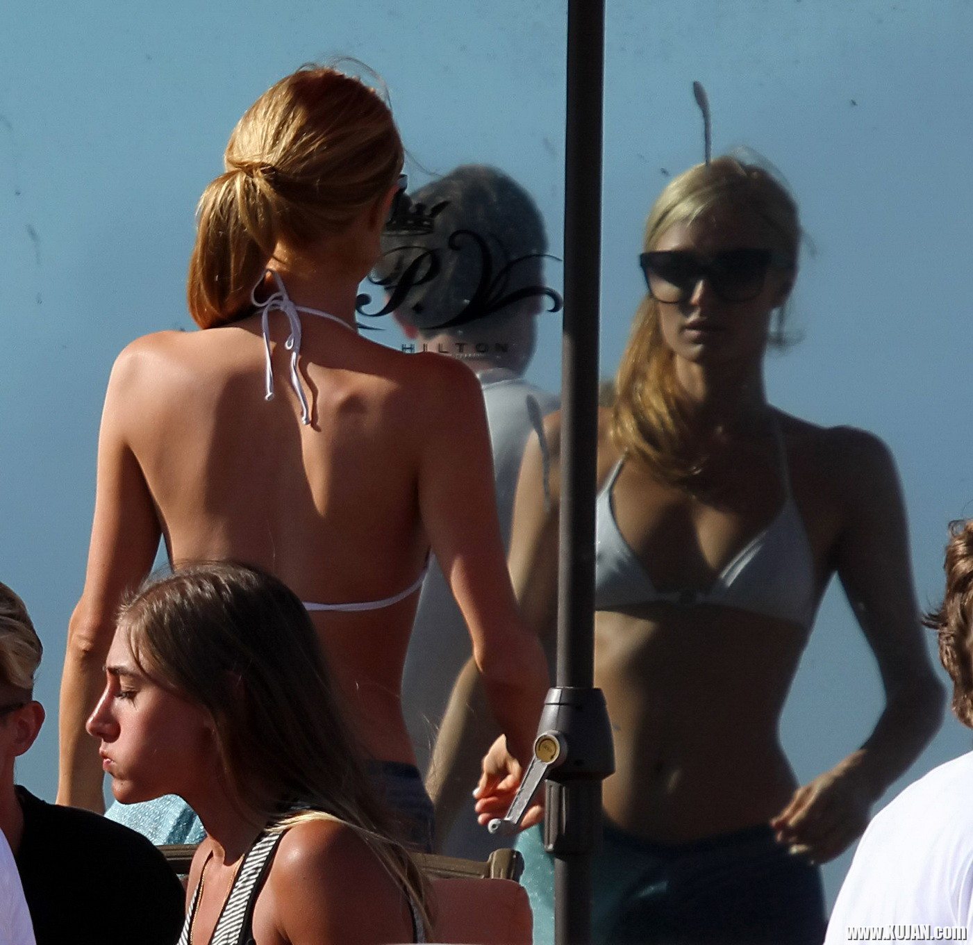 Paris Hilton showing her hard pokies in white transparent bikini top on the beac - Photo #1480150