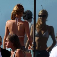 Paris Hilton showing her hard pokies in white transparent bikini top on the beac