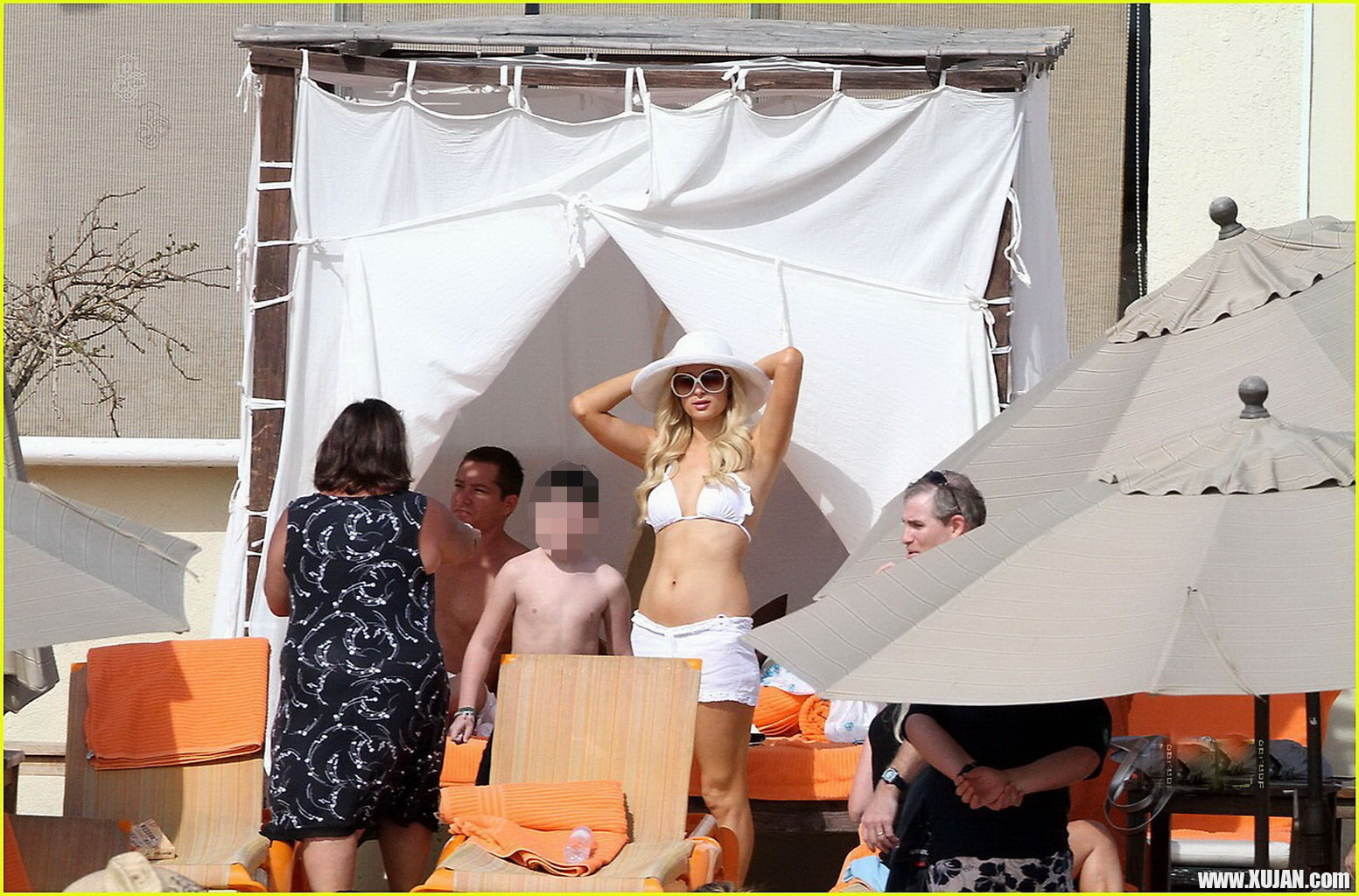Paris Hilton wearing sexy white bikini seethrough shorts at the beach in Cabo - Photo #1480173