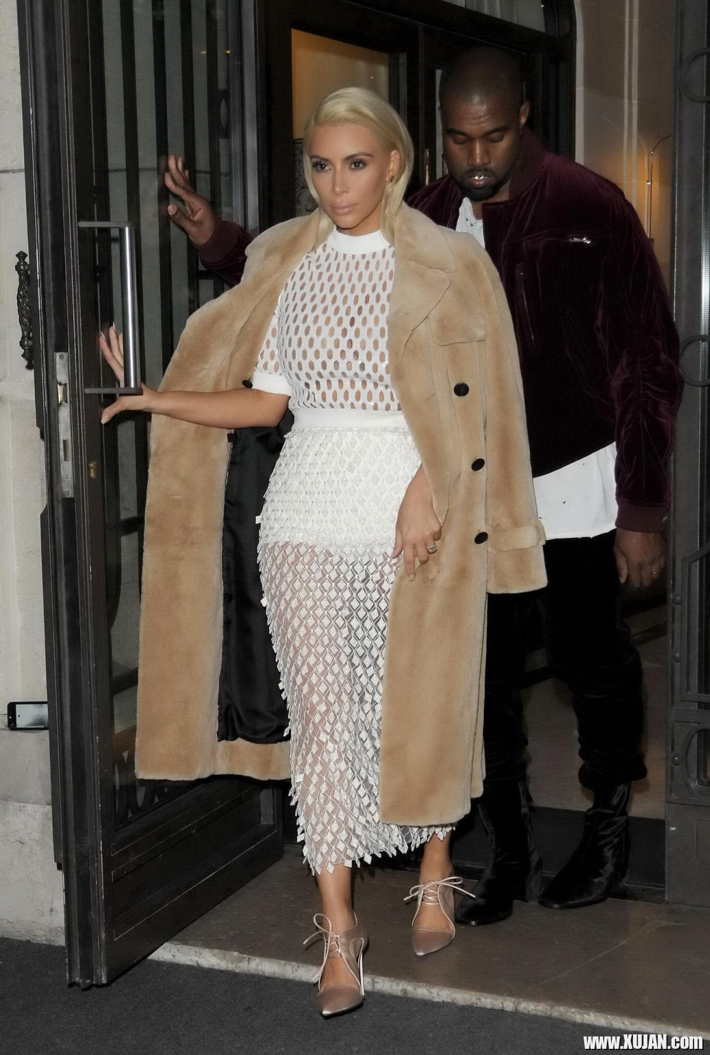 Kim Kardashian in a white mesh dress leaving her hotel in Paris - Photo #1480431