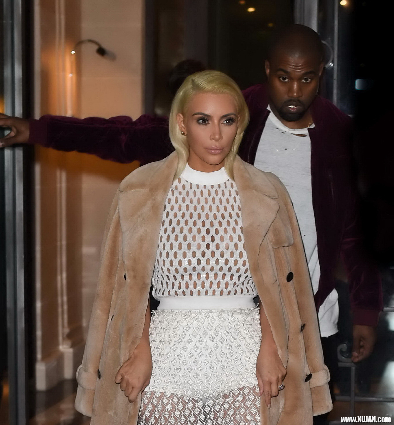 Kim Kardashian in a white mesh dress leaving her hotel in Paris - Photo #1480438