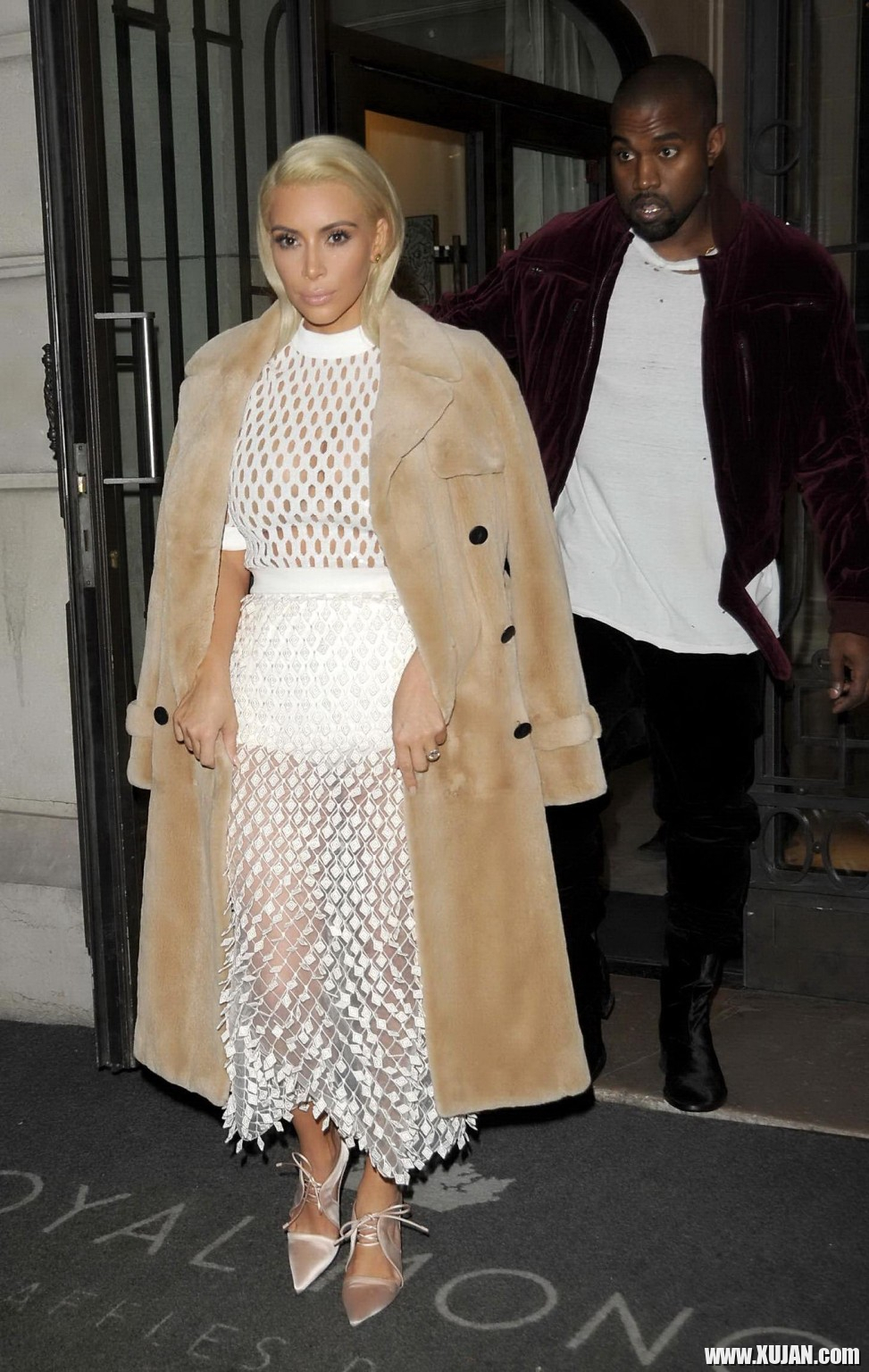 Kim Kardashian in a white mesh dress leaving her hotel in Paris - Photo #1480439