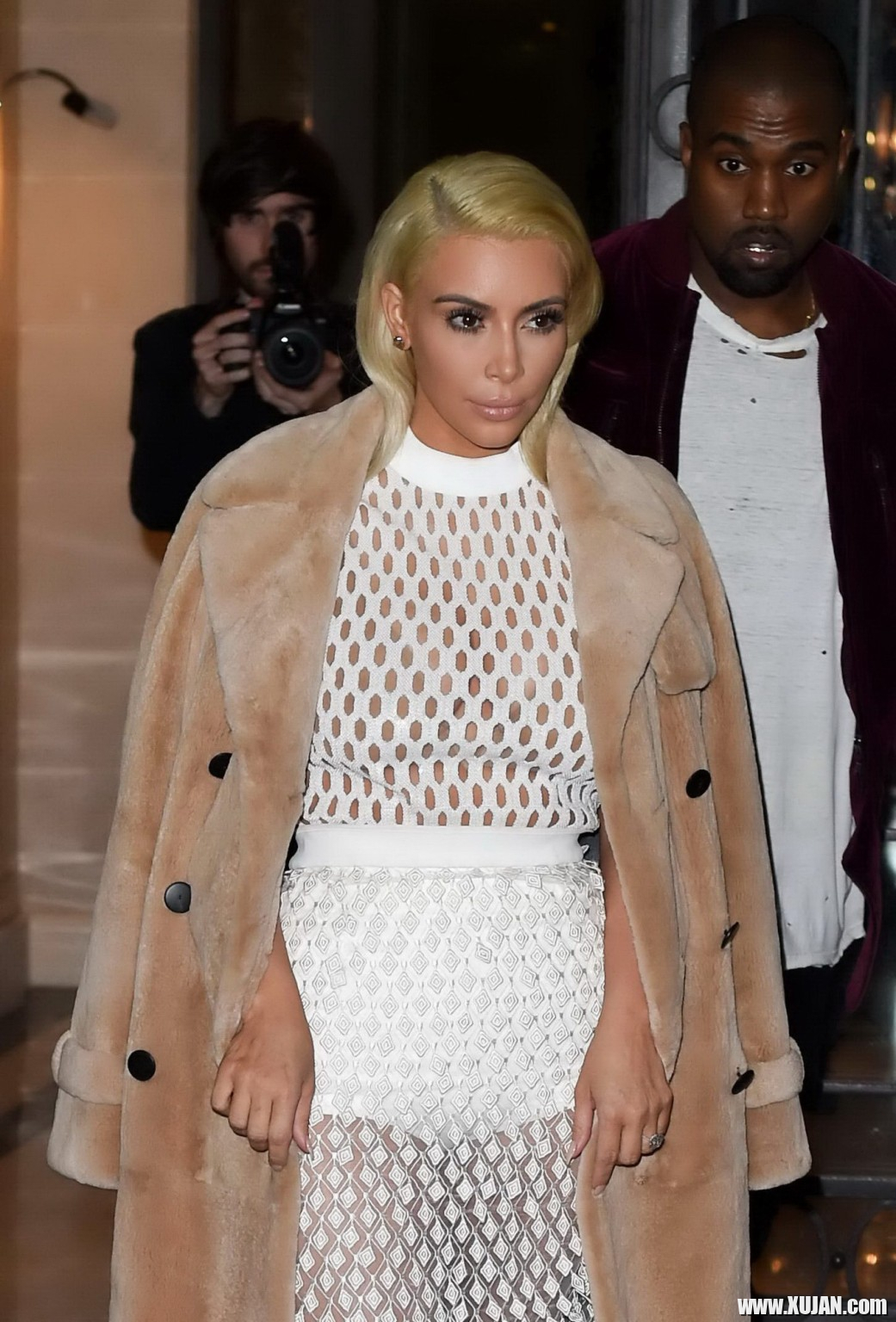 Kim Kardashian in a white mesh dress leaving her hotel in Paris - Photo #1480442
