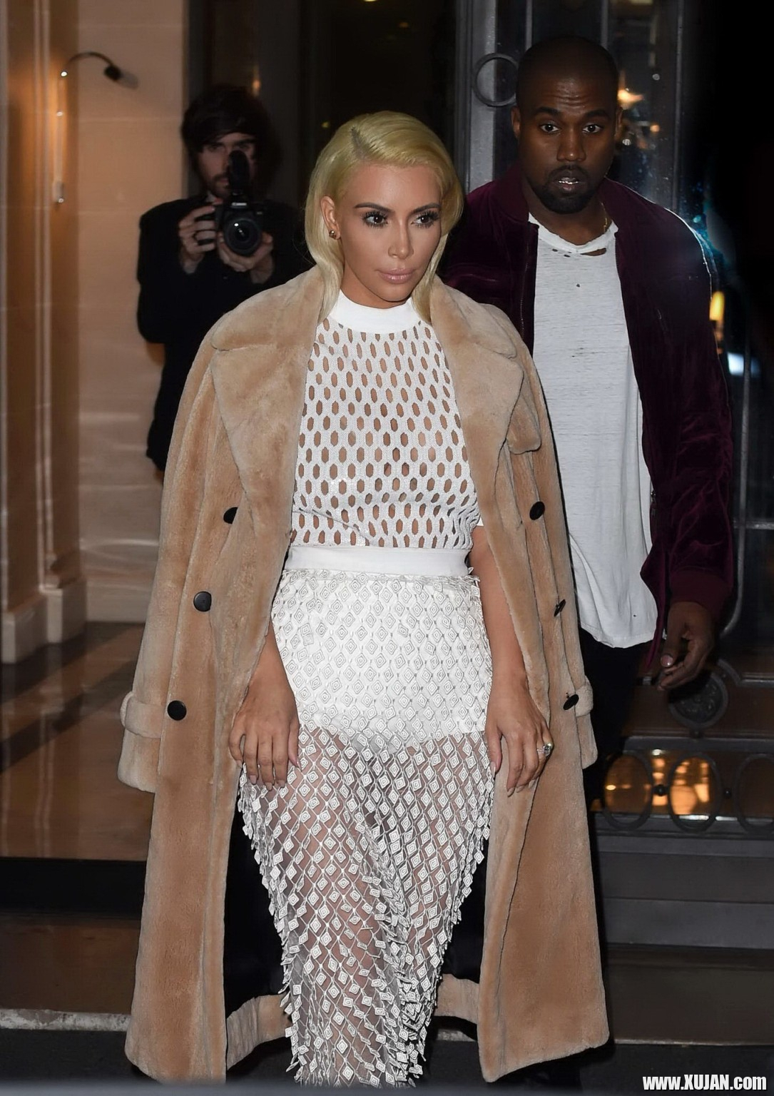 Kim Kardashian in a white mesh dress leaving her hotel in Paris - Photo #1480445