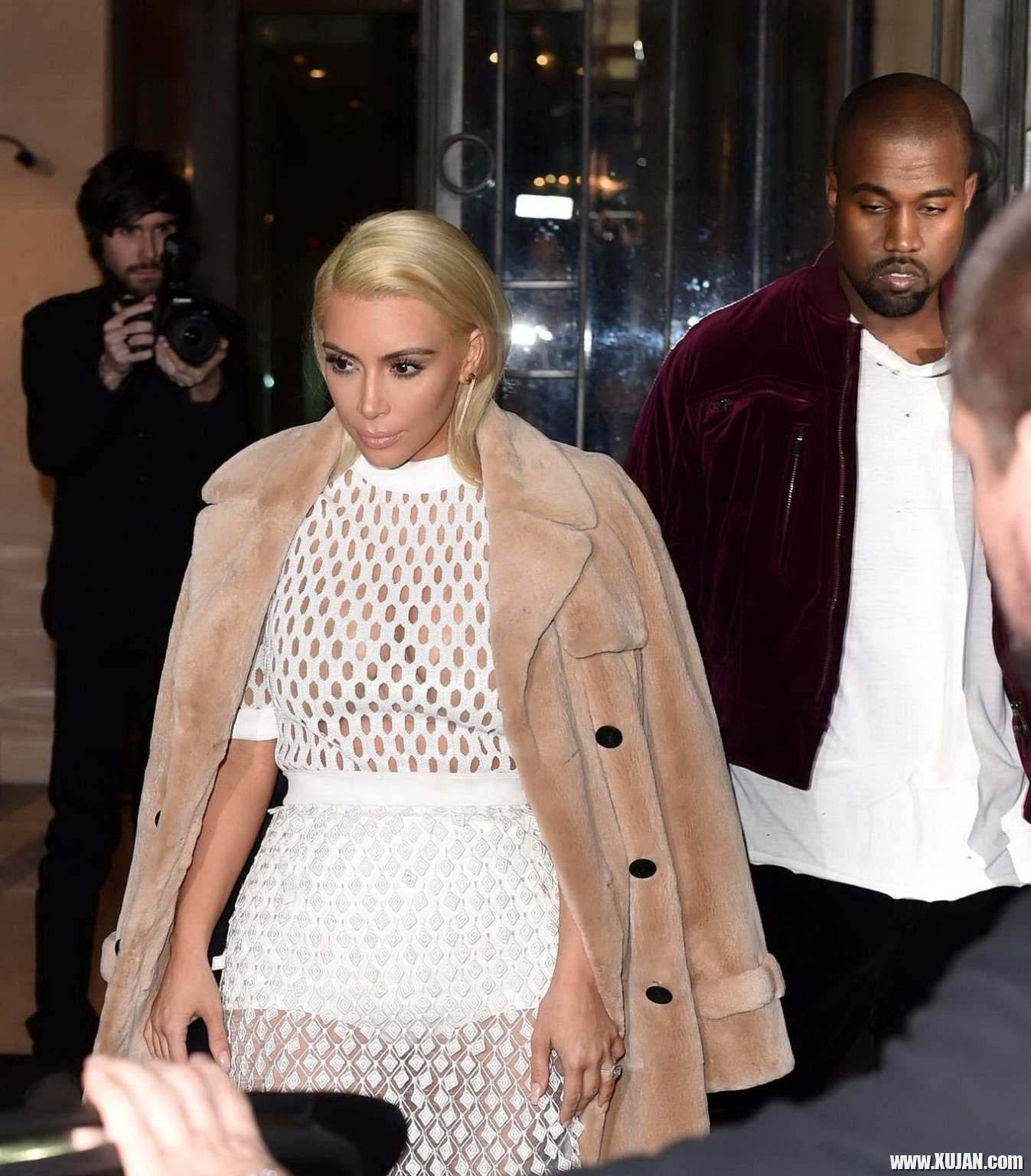 Kim Kardashian in a white mesh dress leaving her hotel in Paris - Photo #1480446