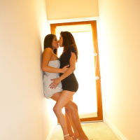 Lesbian lovers Madelyn Marie and Marlena kiss each other passionately
