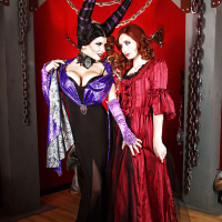 Cosplay lesbians Romi Rain and Violet Monroe kissing and posing