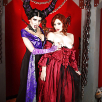 Cosplay lesbians Romi Rain and Violet Monroe kissing and posing