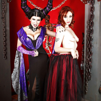 Cosplay lesbians Romi Rain and Violet Monroe kissing and posing