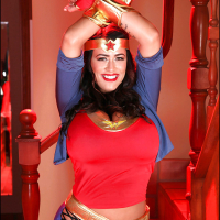 Stunning pornstar with big tits Leanne Crow dose cosplay in her sexy suit