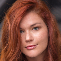 Redheaded babe Mia Sollis flaunting perky teen boobs for glamour photos