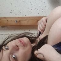 Lovely Lilith unveils her huge boobs while posing
