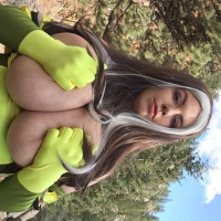 Solo hottie Lovely Lilith unveils her huge tits outdoors