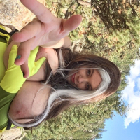Solo hottie Lovely Lilith unveils her huge tits outdoors