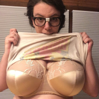Lovely Lilith seductively plays with massive Boobs