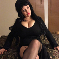 Lovely Lilith teases with Tits in sexy Goth Style