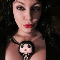 Lovely Lilith teases with Tits in sexy Goth Style