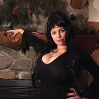 Lovely Lilith teases with Tits in sexy Goth Style