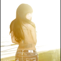 Tattooed Latina solo girl Lela Star modelling outdoors in jeans