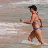 Britney Spears booty wearing skimpy blue bikini at the beach in Hawaii
