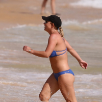 Britney Spears booty wearing skimpy blue bikini at the beach in Hawaii