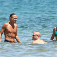 Britney Spears showing pokies in wet blue bikini on the beach in Maui