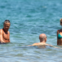 Britney Spears showing pokies in wet blue bikini on the beach in Maui