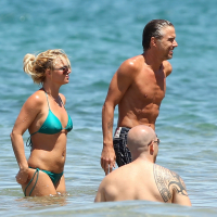 Britney Spears showing pokies in wet blue bikini on the beach in Maui