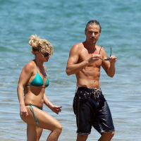 Britney Spears showing pokies in wet blue bikini on the beach in Maui