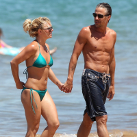 Britney Spears showing pokies in wet blue bikini on the beach in Maui