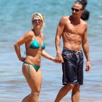 Britney Spears showing pokies in wet blue bikini on the beach in Maui