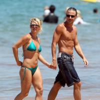 Britney Spears showing pokies in wet blue bikini on the beach in Maui