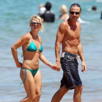 Britney Spears showing pokies in wet blue bikini on the beach in Maui