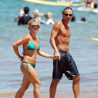Britney Spears showing pokies in wet blue bikini on the beach in Maui