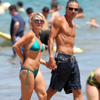 Britney Spears showing pokies in wet blue bikini on the beach in Maui