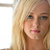 Gorgeous blonde babe Kenze Thomas posing in softcore erotica