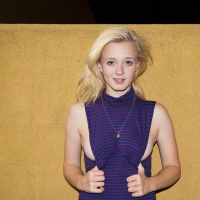 Blonde teen Kenze Thomas teases in her blue dress