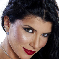 Latina babe Romi Rain shows off her awesome tattoo and boobies