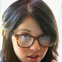 Glasses on round face of cute girl Madelyn Monroe stress her tiny tits