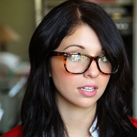 Glasses on round face of cute girl Madelyn Monroe stress her tiny tits