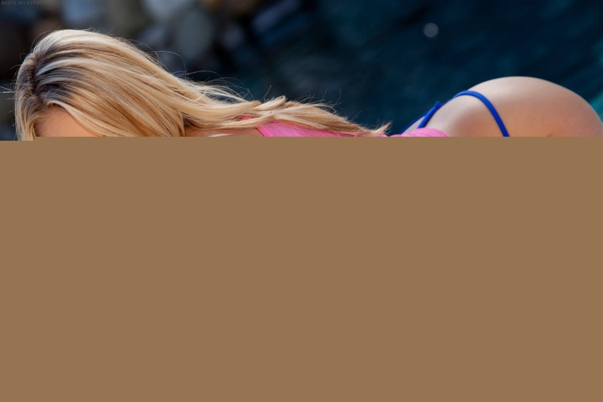 Lena Nicole smiles for the camera while posing at the pool - Photo #1531417
