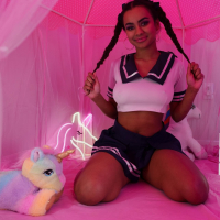 Numi Zarah takes off her uniform to reveal her sexy curves