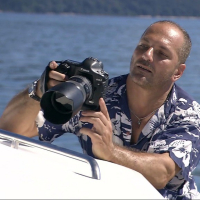 Busty double penetrated on the deck of a yacht