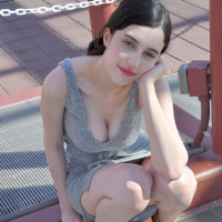 Slim dark haired girl Giulia Wylde posing topless in outdoor garden