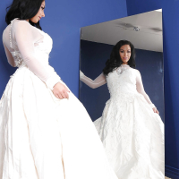 Steaming hot bride in stockings Bella Reese uncovering her gorgeous curves