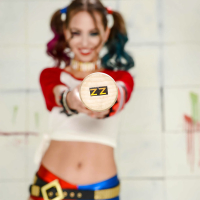 Cosplay attired model Riley Reid exposing tiny tits in pigtails and heels