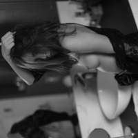 Gorgeous girl Lily Chey teasing with her nice boobies