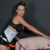 Bound and Pegged Femdom Action