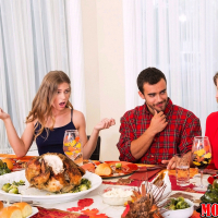 Cory Chase and Sydney Cole share a meat pole on Thanksgiving
